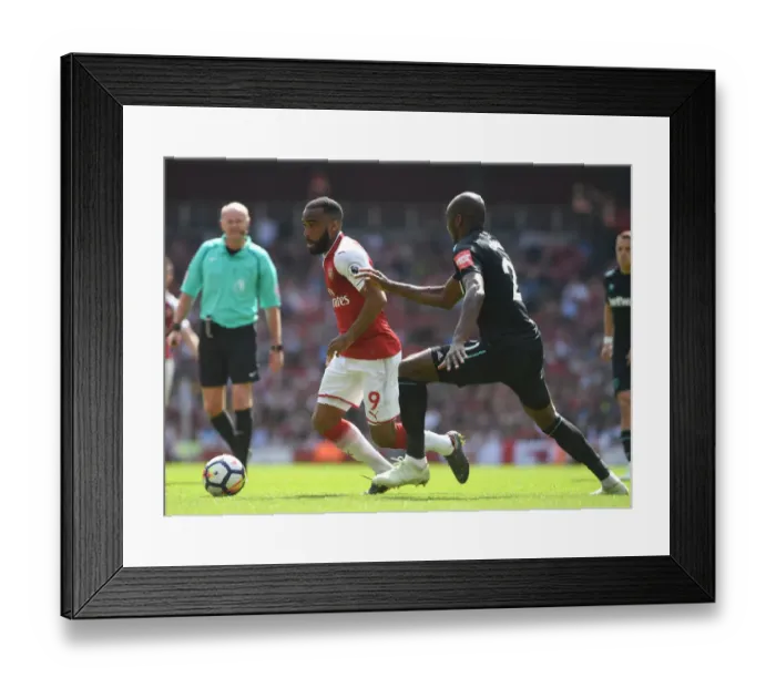 Framed Print : Clash of Titans: Lacazette vs. Ogbonna in Arsenal's Battle Against West Ham Framed Print : Clash of Titans: Lacazette vs. Ogbonna in Arsenal's Battle Against West Ham