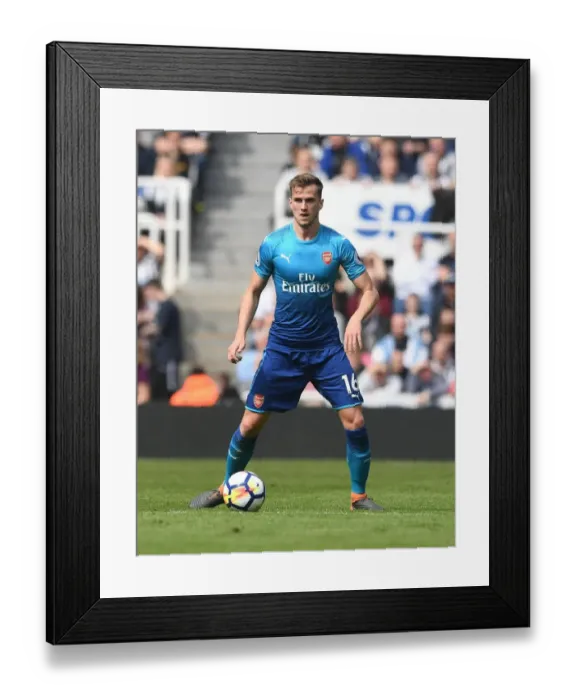 Framed Print : Rob Holding in Action: Arsenal's Defensive Hero at St. James Park (Newcastle United vs Arsenal, Premier League 2017-18)