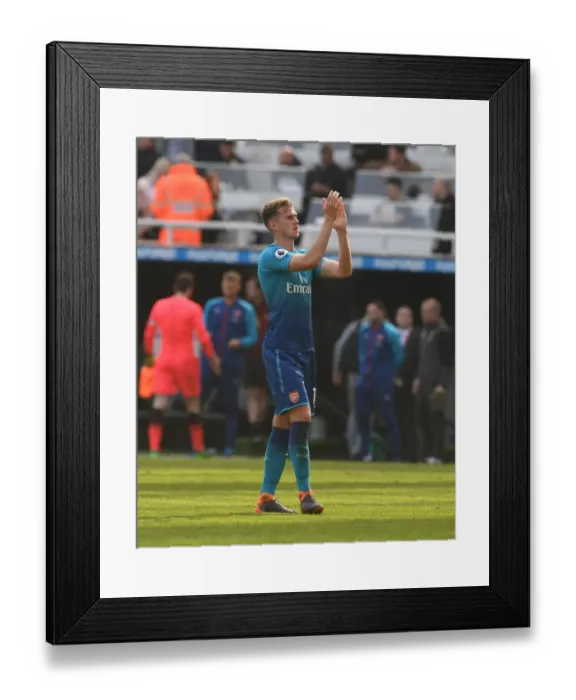 Framed Print : Rob Holding Celebrates with Arsenal Fans after Newcastle United Victory Framed Print : Rob Holding Celebrates with Arsenal Fans after Newcastle United Victory