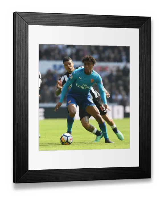Framed Print : Clash of Wings: Iwobi vs. Kenedy - Newcastle United vs. Arsenal, Premier League Framed Print : Clash of Wings: Iwobi vs. Kenedy - Newcastle United vs. Arsenal, Premier League