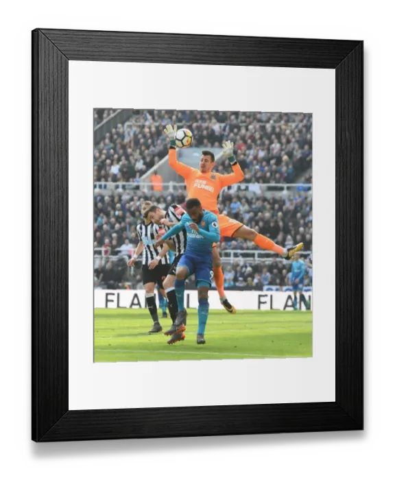 Framed Print : Clash at St. James Park: Lacazette Faces Off Against Dummett and Dubravka (Newcastle vs. Arsenal, Premier League) Framed Print : Clash at St. James Park: Lacazette Faces Off Against Dummett and Dubravka (Newcastle vs. Arsenal, Premier League)