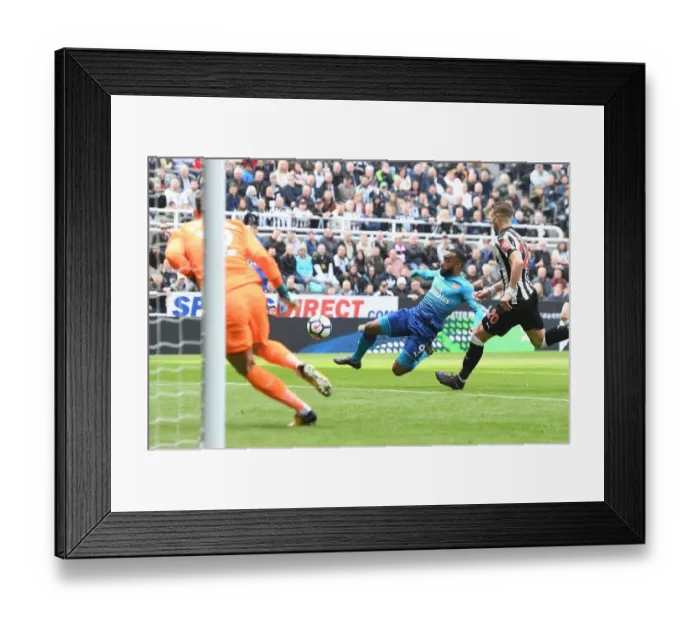 Framed Print : Alexandre Lacazette's Thrilling Goal: Arsenal Triumphs Over Newcastle United (April 2018) Framed Print : Alexandre Lacazette's Thrilling Goal: Arsenal Triumphs Over Newcastle United (April 2018)