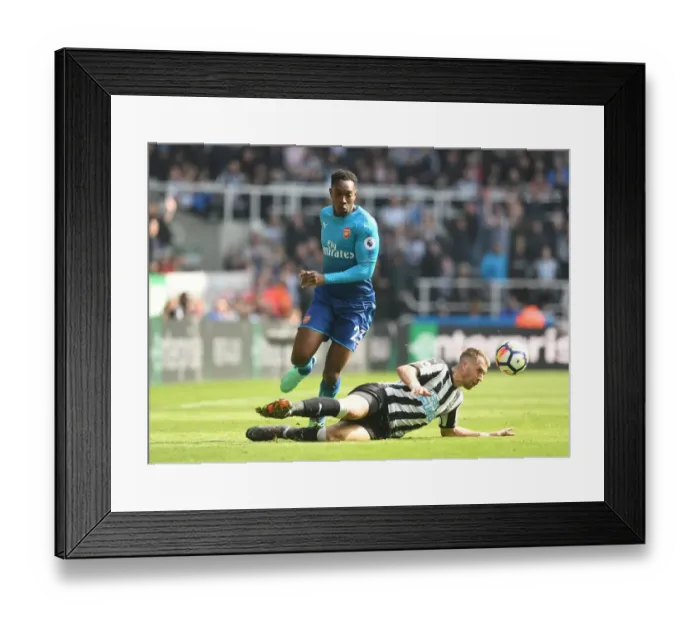 Framed Print : Clash at St. James Park: Welbeck vs Joselu in Intense Premier League Battle Framed Print : Clash at St. James Park: Welbeck vs Joselu in Intense Premier League Battle