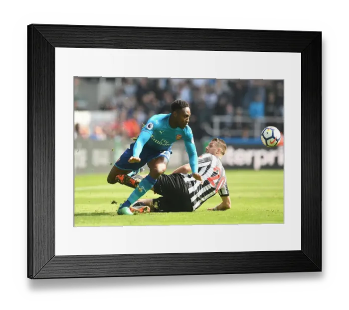 Framed Print : Intense Battle: Welbeck vs Joselu - Premier League Showdown at St. James Park Framed Print : Intense Battle: Welbeck vs Joselu - Premier League Showdown at St. James Park
