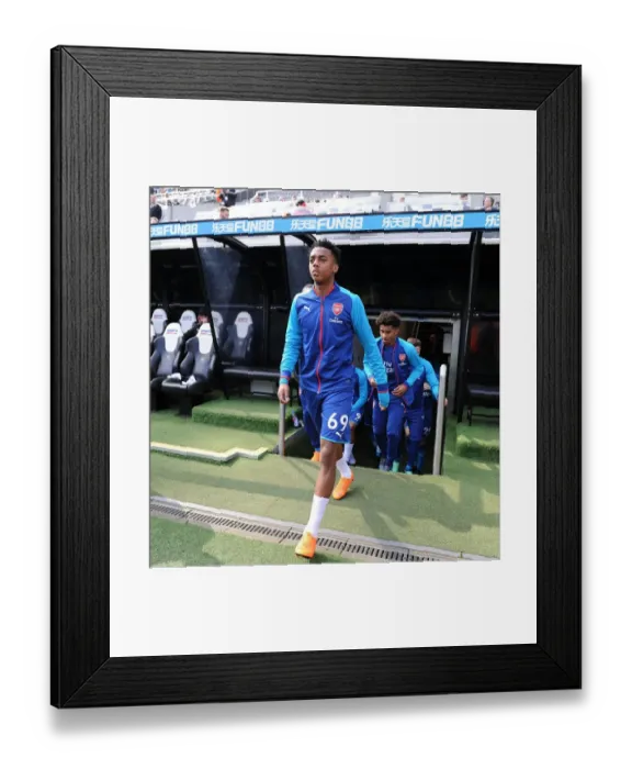 Framed Print : Joe Willock Gears Up: Arsenal's Young Gun Readies for Newcastle United Clash (Newcastle United v Arsenal 2017-18)
