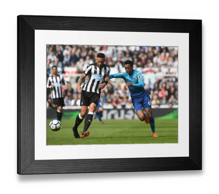 Framed Print : Intense Rivalry: Willock vs Lascelles Battle - Newcastle United vs Arsenal Premier League Clash Framed Print : Intense Rivalry: Willock vs Lascelles Battle - Newcastle United vs Arsenal Premier League Clash