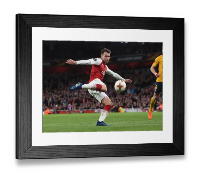 Framed Print : Determined Aaron Ramsey: Arsenal's Battle Against Atletico Madrid in Europa League Semi-Final Framed Print : Determined Aaron Ramsey: Arsenal's Battle Against Atletico Madrid in Europa League Semi-Final