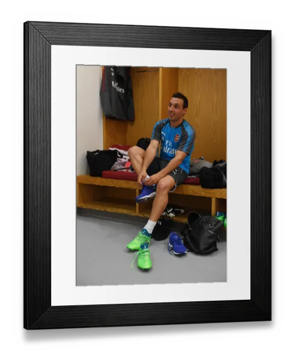 Framed Print : Arsenal's Cazorla: Pre-Match Focus before Semi-Final Clash with Atletico Madrid