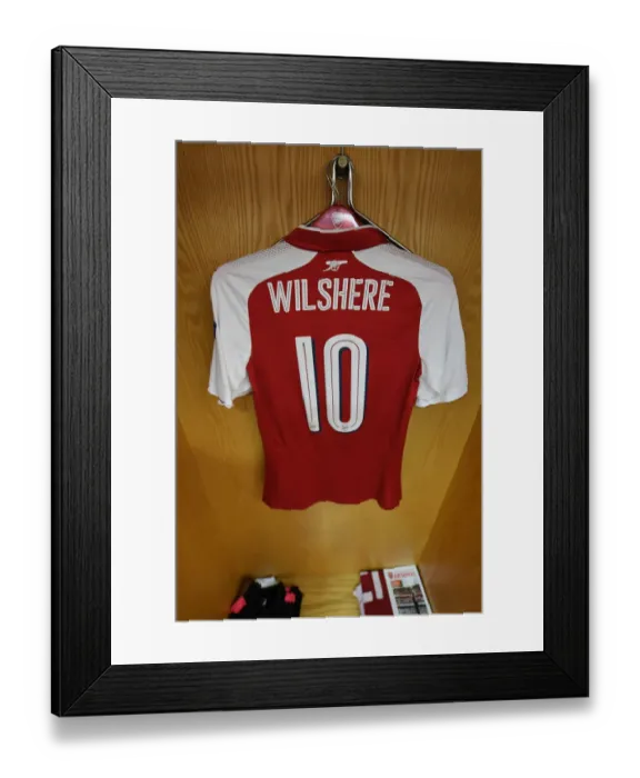 Framed Print : Arsenal FC vs Atletico Madrid: Jack Wilshere's Empty Jersey in the Home Changing Room - UEFA Europa League Semi Final Framed Print : Arsenal FC vs Atletico Madrid: Jack Wilshere's Empty Jersey in the Home Changing Room - UEFA Europa League Semi Final