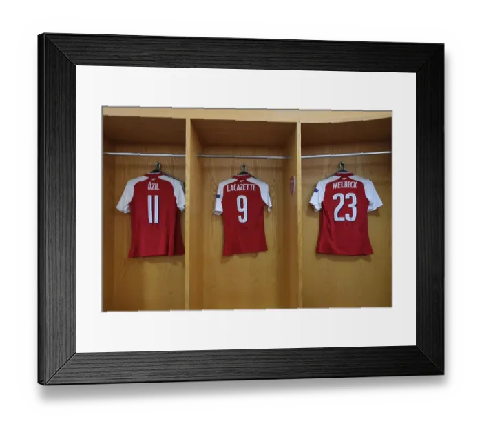 Framed Print : Arsenal FC: Ozil, Lacazette, and Welbeck's Empty Jerseys in the Home Changing Room Ahead of Atletico Madrid Clash (UEFA Europa League Semi-Final Leg One)