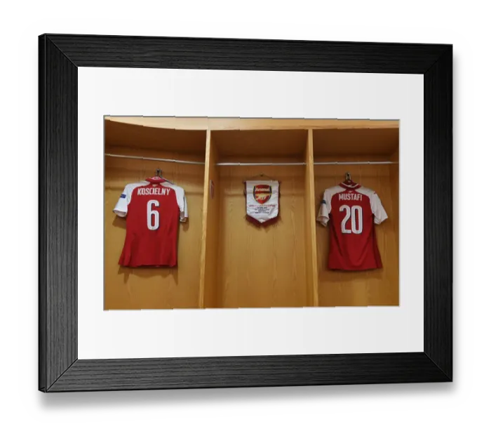 Framed Print : Arsenal FC's Empty Changing Room: Koscielny, Mustafi, Ozil, Lacazette, and Welbeck's Absence in UEFA Europa League Semi-Final vs Atletico Madrid