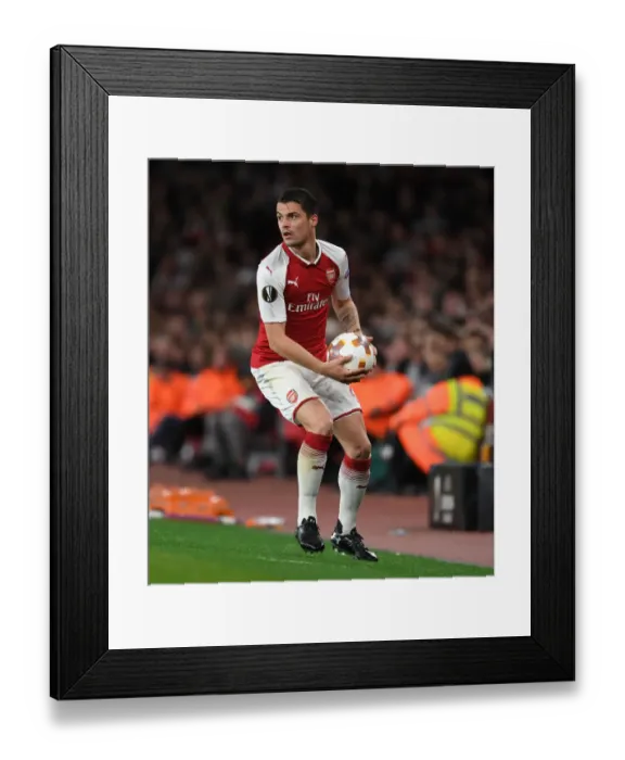 Framed Print : Granit Xhaka: Arsenal's Europa League Hero in Action against Atletico Madrid Framed Print : Granit Xhaka: Arsenal's Europa League Hero in Action against Atletico Madrid