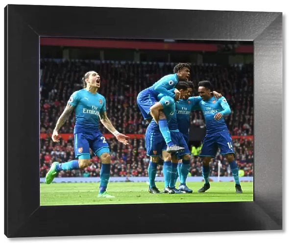 Arsenal's Mkhitaryan, Aubameyang, Xhaka, Iwobi, and Bellerin Celebrate Goal Against Manchester United