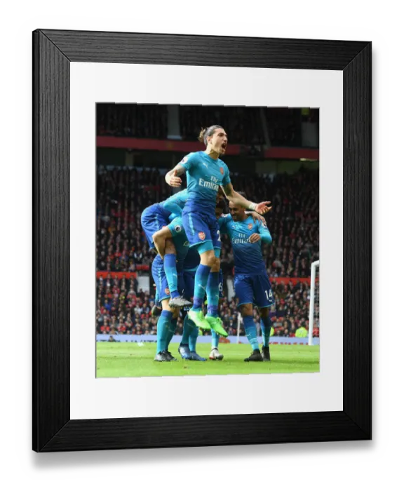 Framed Print : Bellerin's Brilliant Goal: Mkhitaryan Strikes Back in Manchester United vs. Arsenal Clash