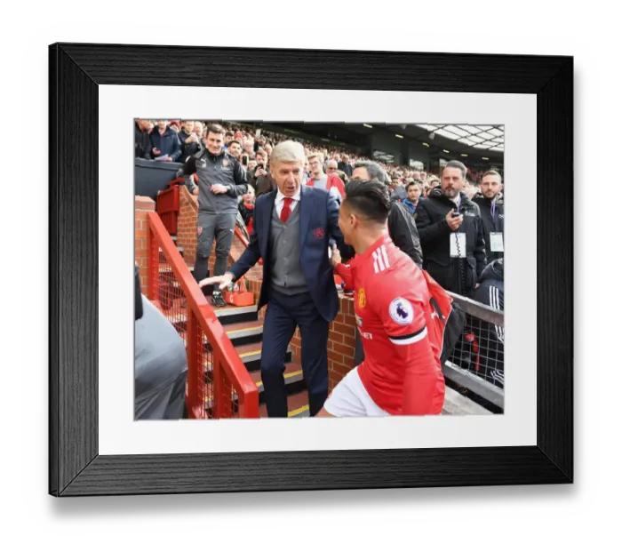 Framed Print : Arsene Wenger Embraces Alexis Sanchez Before Manchester United vs. Arsenal (2017-18)