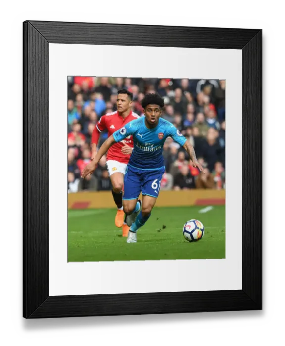 Framed Print : Reiss Nelson Faces Off Against Manchester United: Arsenal vs. Manchester United, Premier League 2017-18 - The Battle Within Old Trafford Framed Print : Reiss Nelson Faces Off Against Manchester United: Arsenal vs. Manchester United, Premier League 2017-18 - The Battle Within Old Trafford