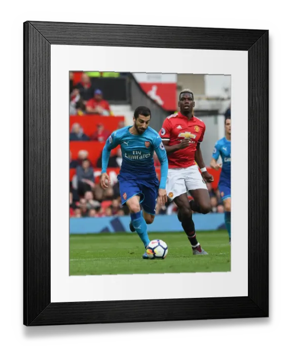 Framed Print : Mkhitaryan vs Pogba: A Premier League Battle at Old Trafford