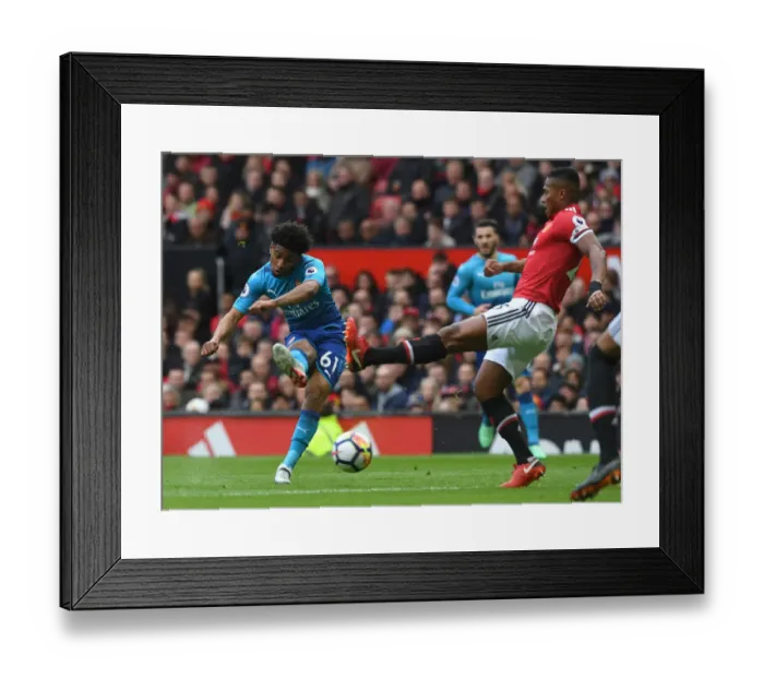 Framed Print : Reiss Nelson vs. Antonio Valencia: Intense Shootout at Old Trafford (Manchester United vs. Arsenal, Premier League 2017-18)