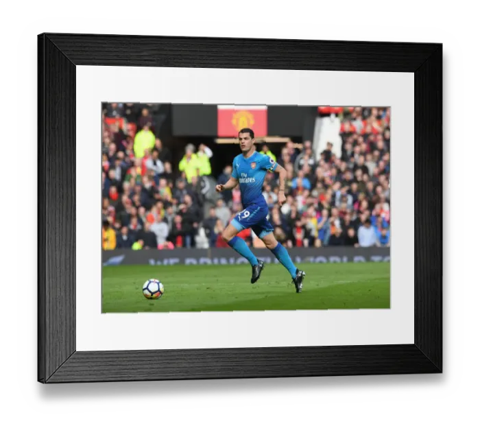 Framed Print : Granit Xhaka: Arsenal Midfielder in Action Against Manchester United, Premier League 2017-18 Framed Print : Granit Xhaka: Arsenal Midfielder in Action Against Manchester United, Premier League 2017-18