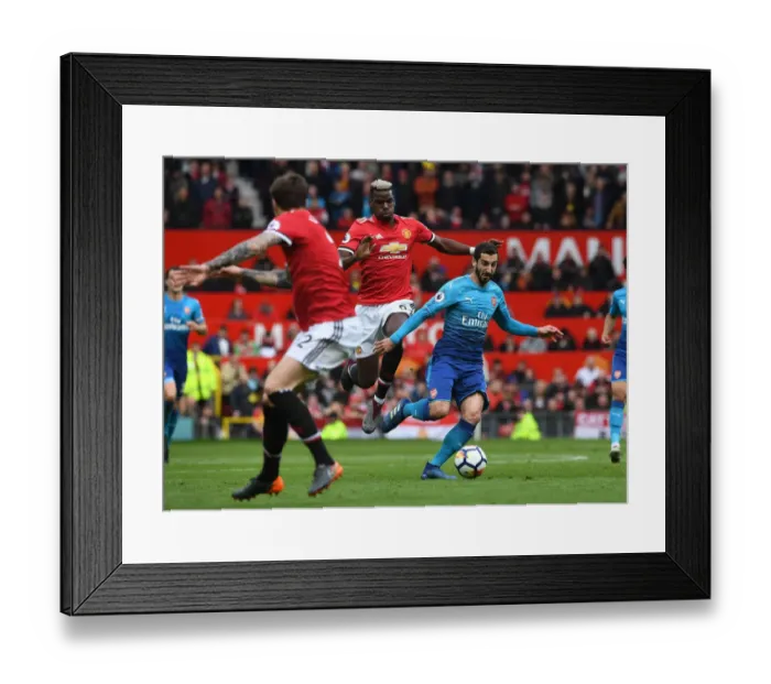 Framed Print : Mkhitaryan vs. Pogba: A Premier League Showdown at Old Trafford