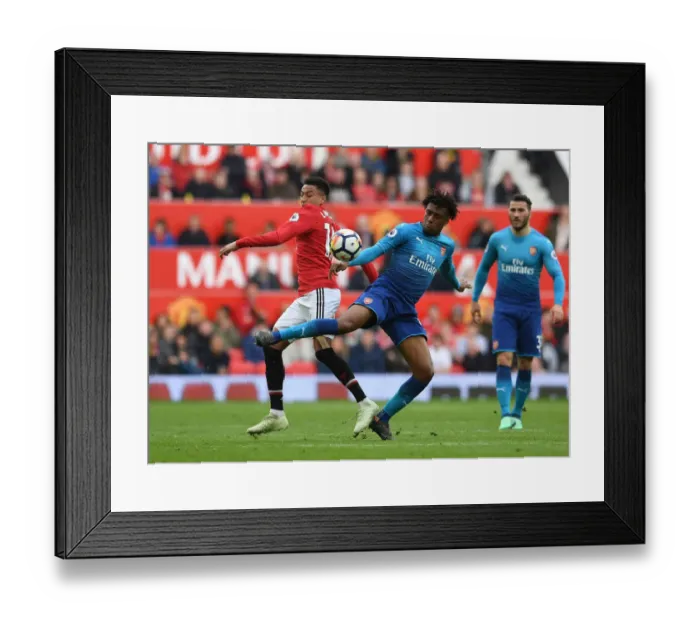 Framed Print : Iwobi vs. Lingard: A Premier League Battle at Old Trafford