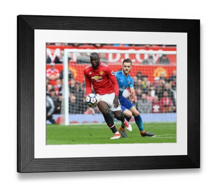 Framed Print : Clash at Old Trafford: Chambers vs Lukaku in Manchester United vs Arsenal Premier League Showdown Framed Print : Clash at Old Trafford: Chambers vs Lukaku in Manchester United vs Arsenal Premier League Showdown