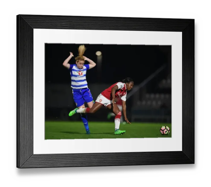 Framed Print : Determination on the Field: Carter vs. Furness in Arsenal Women vs. Reading Ladies Clash Framed Print : Determination on the Field: Carter vs. Furness in Arsenal Women vs. Reading Ladies Clash