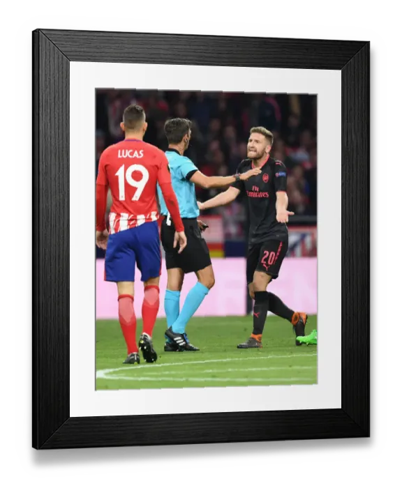 Framed Print : Mustafi's Dispute with Referee Rocchi in Arsenal's UEFA Europa League Semi-Final Clash against Atletico Madrid Framed Print : Mustafi's Dispute with Referee Rocchi in Arsenal's UEFA Europa League Semi-Final Clash against Atletico Madrid