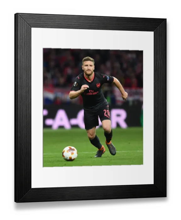 Framed Print : Shkodran Mustafi in Action: Arsenal vs Atletico Madrid, UEFA Europa League Semi-Final