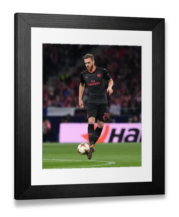 Framed Print : Calum Chambers in Action: Arsenal's Europa League Showdown against Atletico Madrid (2018)