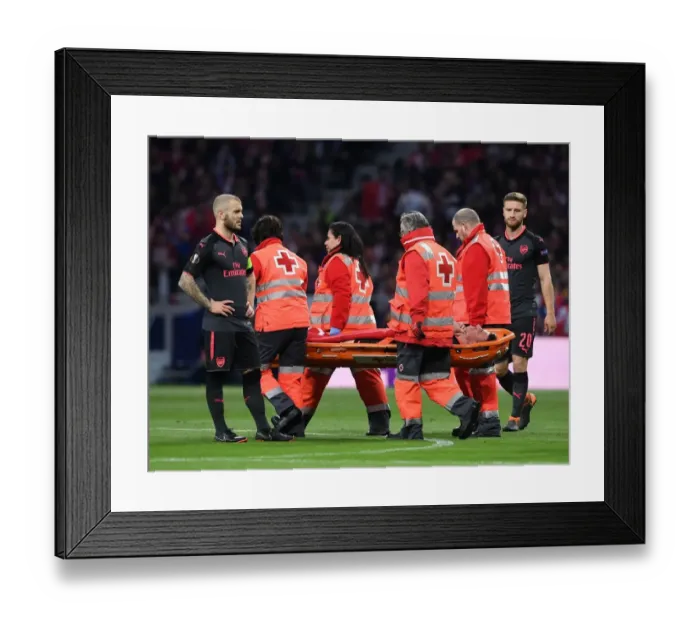 Framed Print : Laurent Koscielny's Heart-wrenching Exit: Atletico Madrid vs. Arsenal, UEFA Europa League Semi-Final Framed Print : Laurent Koscielny's Heart-wrenching Exit: Atletico Madrid vs. Arsenal, UEFA Europa League Semi-Final
