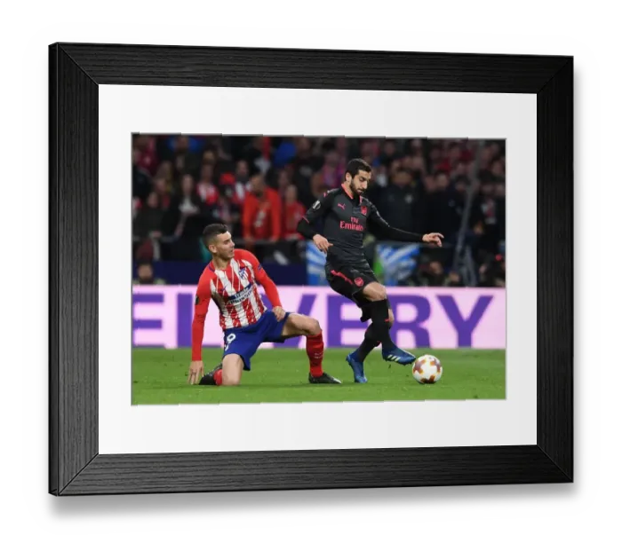 Framed Print : Mkhitaryan Evades Hernandez: Intense Moment from Arsenal's Europa League Semi-Final Clash with Atletico Madrid Framed Print : Mkhitaryan Evades Hernandez: Intense Moment from Arsenal's Europa League Semi-Final Clash with Atletico Madrid