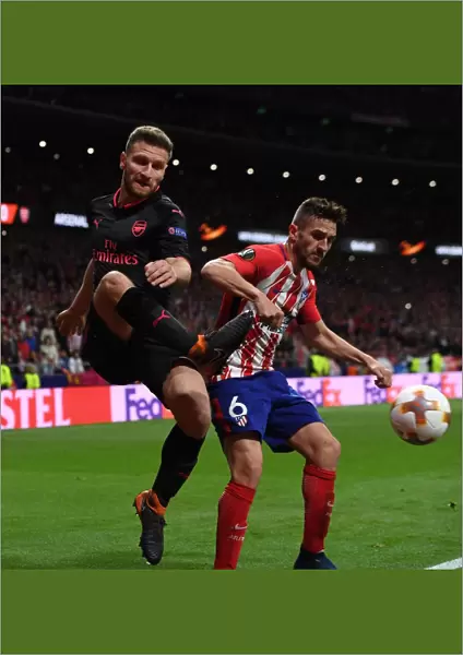 Mustafi vs Koke: Intense Clash in Arsenal's Europa League Semi-Final Showdown against Atletico Madrid