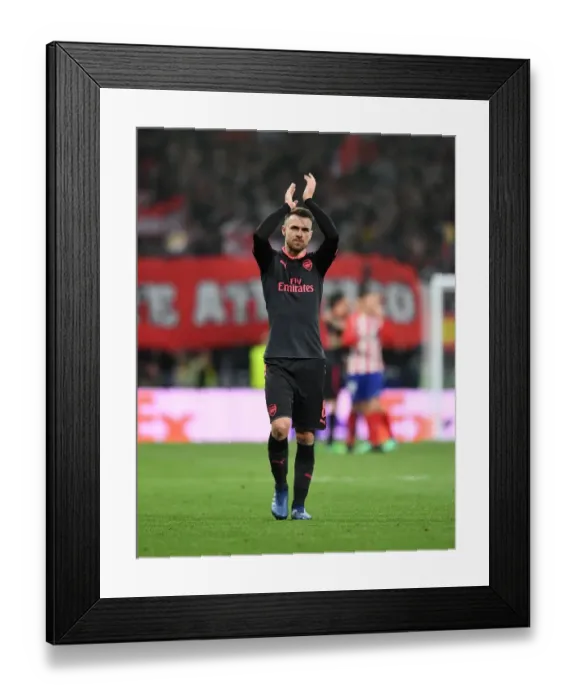 Framed Print : Aaron Ramsey's Triumphant Clap: Arsenal's Europa League Semi-Final Battle with Atletico Madrid Framed Print : Aaron Ramsey's Triumphant Clap: Arsenal's Europa League Semi-Final Battle with Atletico Madrid