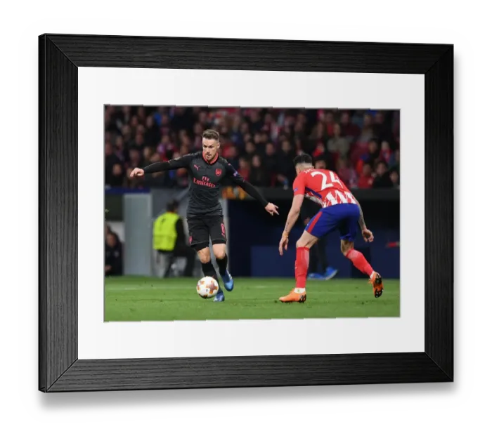 Framed Print : Clash of Titans: Ramsey vs. Gimenez in the Europa League Semi-Final Showdown