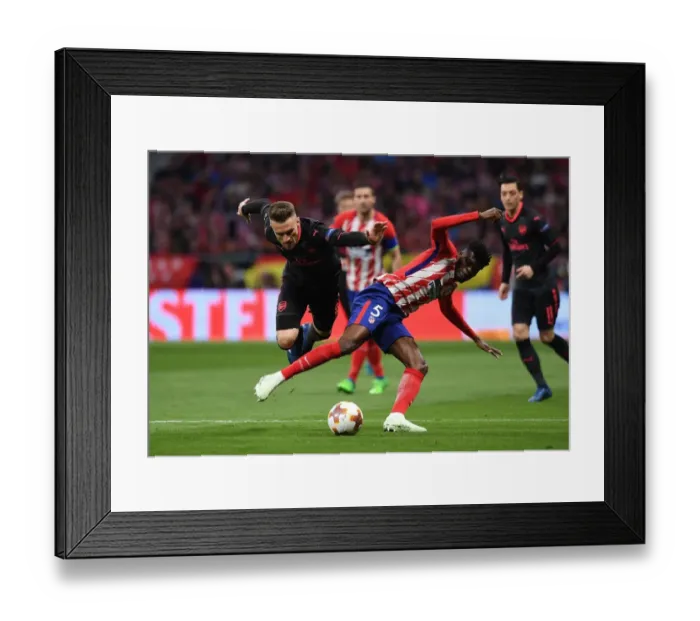 Framed Print : Clash of Midfield Titans: Ramsey vs. Partey - Arsenal vs. Atletico Madrid, UEFA Europa League Semi-Final