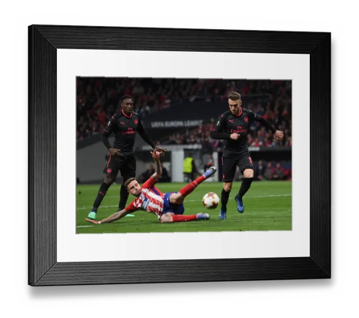 Framed Print : Clash of Midfield Titans: Ramsey vs. Saul in Arsenal's Europa League Battle against Atletico Madrid Framed Print : Clash of Midfield Titans: Ramsey vs. Saul in Arsenal's Europa League Battle against Atletico Madrid