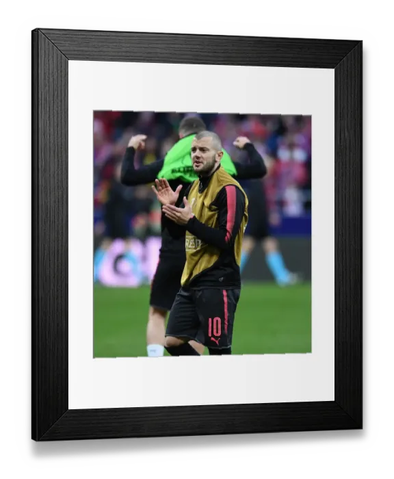 Framed Print : Jack Wilshere: Arsenal's Determined Figure Ahead of Atletico Madrid Europa League Showdown
