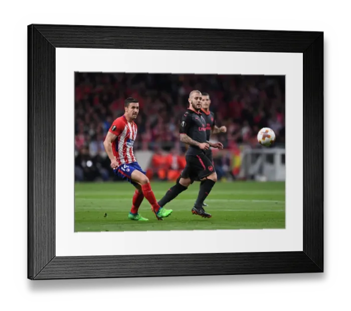 Framed Print : Jack Wilshere vs. Gabi: Battle in the Europa League Semi-Final Framed Print : Jack Wilshere vs. Gabi: Battle in the Europa League Semi-Final