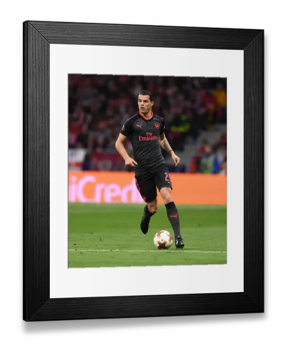 Framed Print : Granit Xhaka in Action: Arsenal vs Atletico Madrid - UEFA Europa League Semi-Final Framed Print : Granit Xhaka in Action: Arsenal vs Atletico Madrid - UEFA Europa League Semi-Final