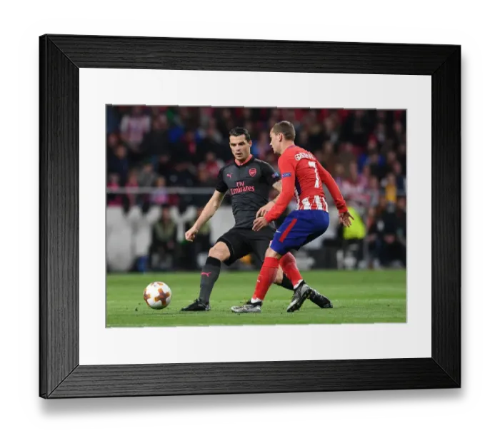 Framed Print : Xhaka vs. Griezmann: Battle in the Europa League Semi-Final Framed Print : Xhaka vs. Griezmann: Battle in the Europa League Semi-Final