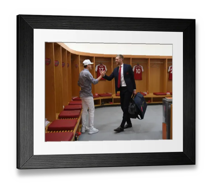 Framed Print : Mesut Ozil and Per Mertesacker in Arsenal Changing Room Before Arsenal v Burnley Match, 2018
