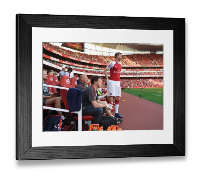 Framed Print : Per Mertesacker Focuses in Arsenal's Final Premier League Match vs Burnley (2017-18)