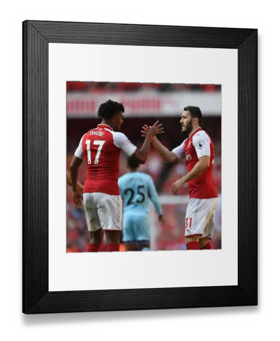 Framed Print : Arsenal Triumph: Sead Kolasinac and Alex Iwobi Celebrate Goals Against Burnley (2017-18) Framed Print : Arsenal Triumph: Sead Kolasinac and Alex Iwobi Celebrate Goals Against Burnley (2017-18)