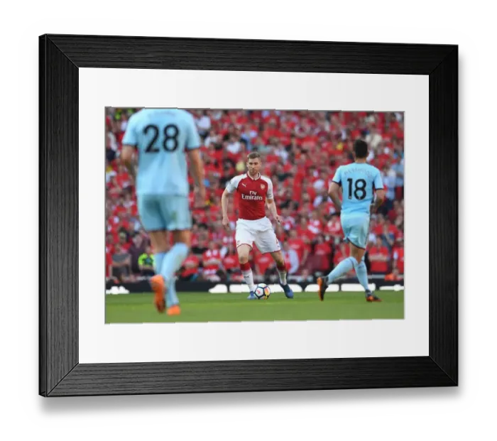 Framed Print : Per Mertesacker Focuses During Arsenal vs Burnley Premier League Clash (2017-18) Framed Print : Per Mertesacker Focuses During Arsenal vs Burnley Premier League Clash (2017-18)
