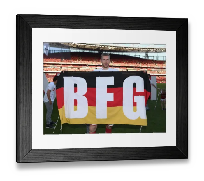 Framed Print : Per Mertesacker: Arsenal's Defiant Moment against Burnley (2017-18) Framed Print : Per Mertesacker: Arsenal's Defiant Moment against Burnley (2017-18)