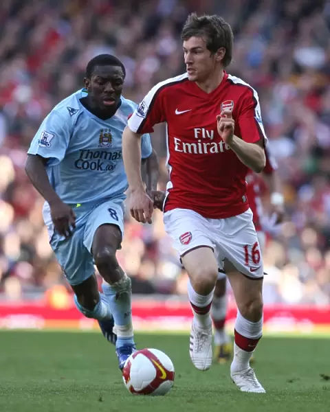 Arsenal's Double Victory: Ramsey and Wright-Phillips Shine in 2-0 Premier League Win over Manchester City at Emirates Stadium, London (April 2009)