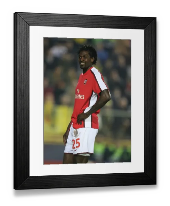 Framed Print : Determined Adebayor: Arsenal's Unyielding Battle in UEFA Champions League Quarterfinal 1st Leg Against Villarreal, 2009