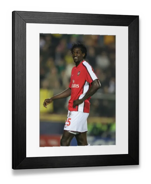 Framed Print : Adebayor's Battle: 1-1 Stalemate against Villarreal in Champions League Quarterfinals