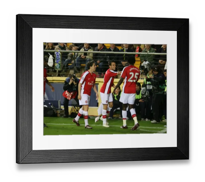 Framed Print : Adebayor, Fabregas, and Nasri: Arsenal's Unforgettable Goal Celebration in the UEFA Champions League Quarterfinal vs Villarreal (2009) Framed Print : Adebayor, Fabregas, and Nasri: Arsenal's Unforgettable Goal Celebration in the UEFA Champions League Quarterfinal vs Villarreal (2009)